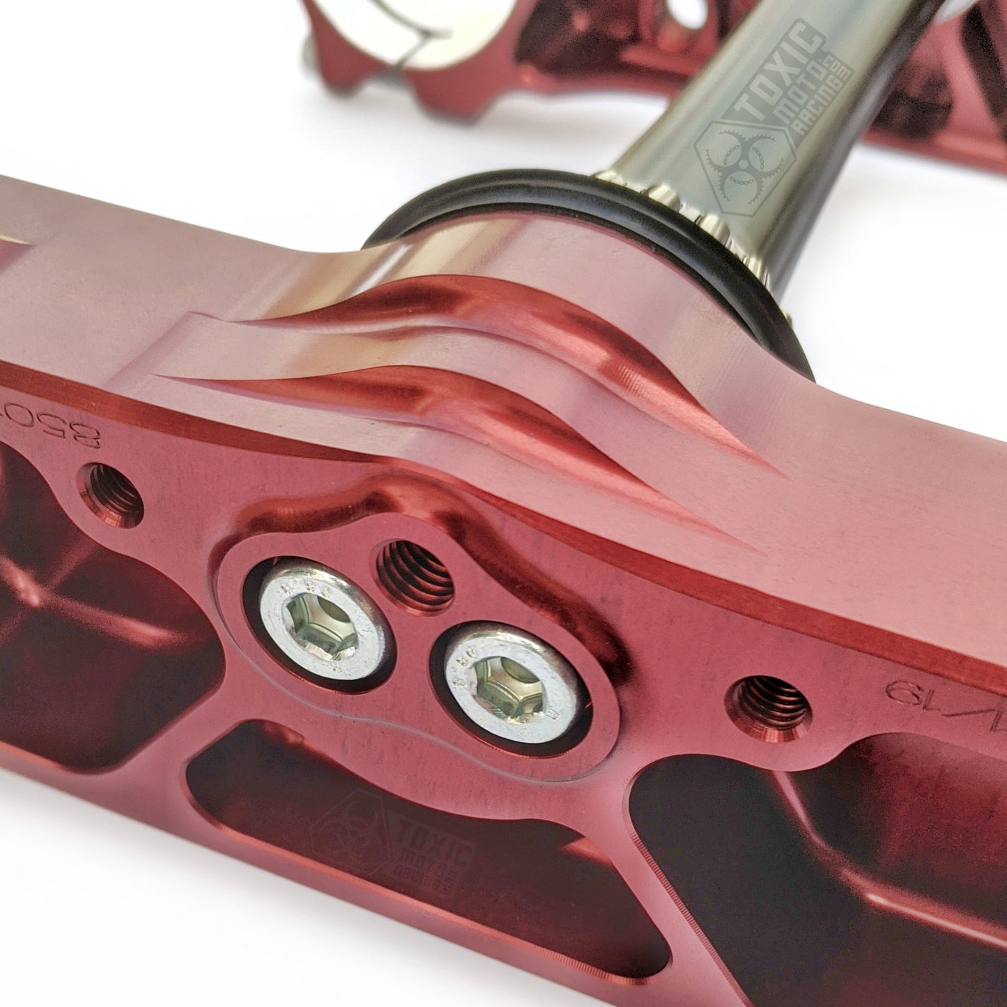 Locking bolts hold the eccentric stem in position.
