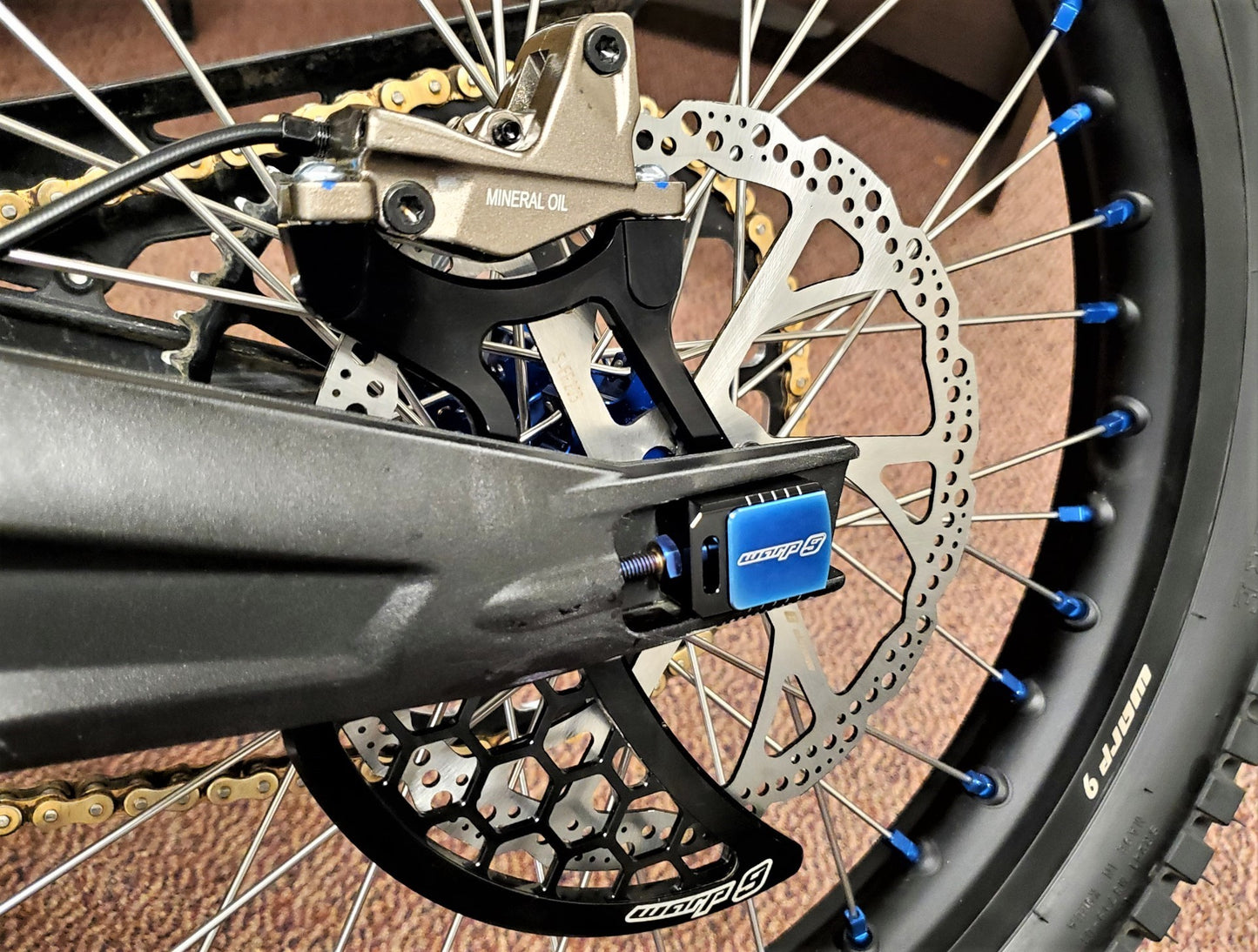 Warp 9 Rear Disc Guard shown with 203mm rotor
